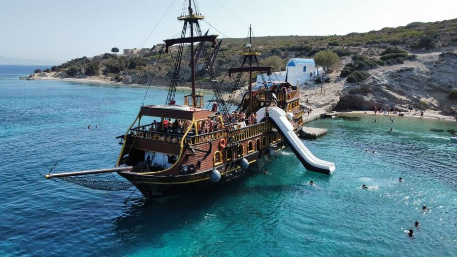 From Kos: 3-Island Pirate Cruise with Lunch and Waterslide - Plati: swimming, snorkeling, and the boat slide