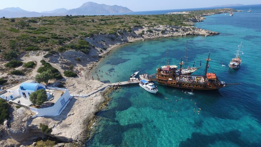 From Kos: 3-Island Pirate Cruise with Lunch and Waterslide - Finding the Barco de Pirata in Kos Harbour