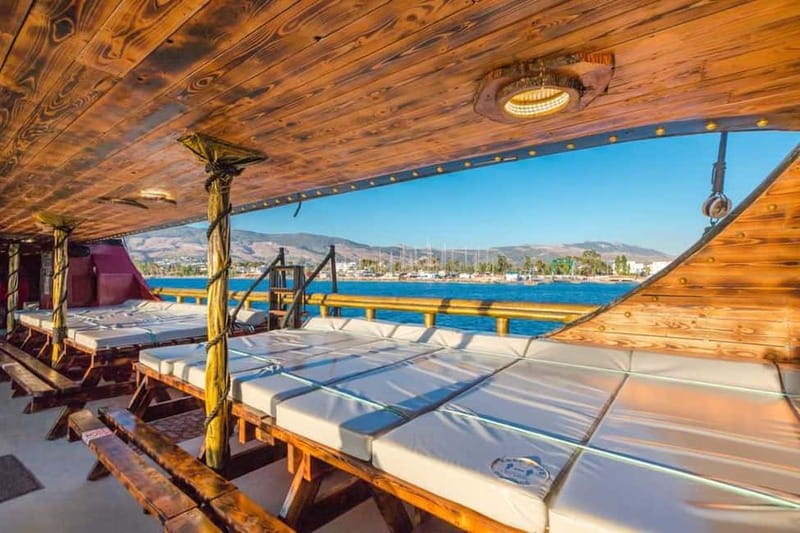 From Kos: Kalymnos, Pserimos and Plati Day Cruise with Lunch - Plati: the party stop with a slide and jumping platform