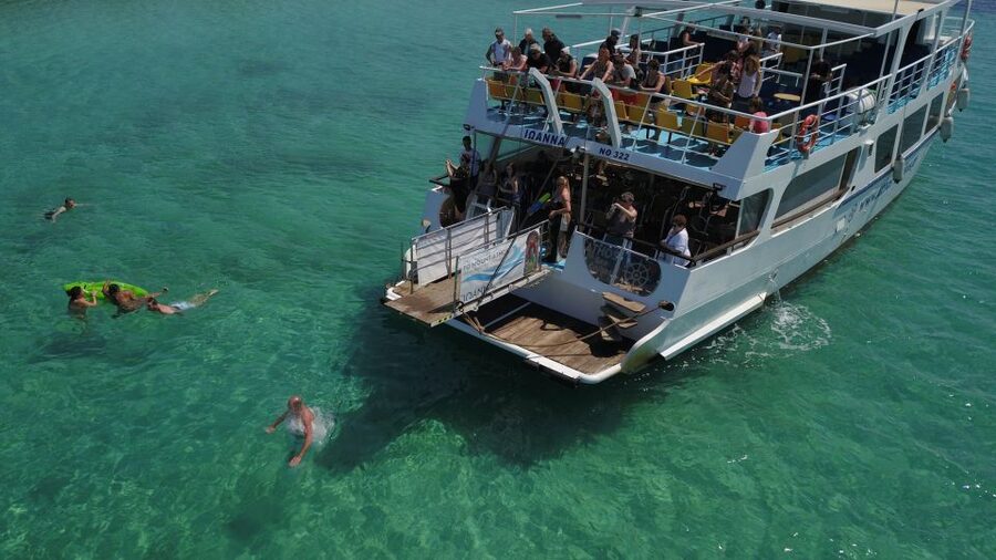 From Ouranoupoli: Blue Lagoon Two Island Cruise - Banana Beach: lunch, umbrellas, and relaxed water time