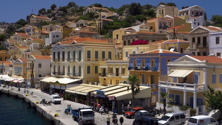 From Rhodes: Boat Trip to Symi Island with Hotel Transfer - Arriving at Symi’s pastel harbor