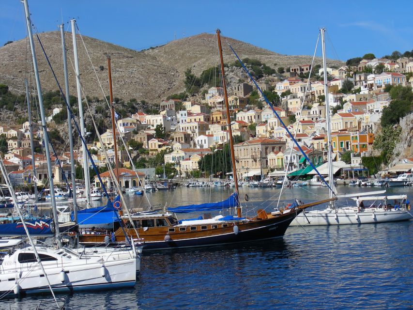 From Rhodes: Boat Trip to Symi Island with Hotel Transfer - Free time, food, and extra costs