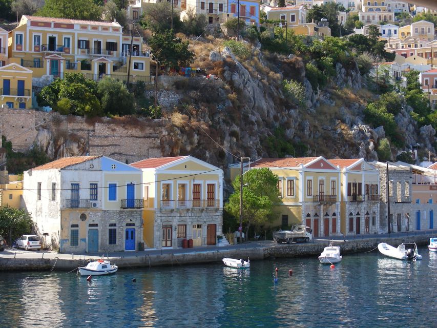 From Rhodes: Boat Trip to Symi Island with Hotel Transfer - What the guide adds to the day