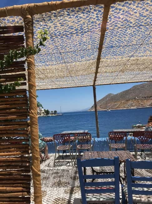 From Rhodes: Symi Island and Panormitis Monastery Day Trip - Arriving in Symi’s colorful harbor