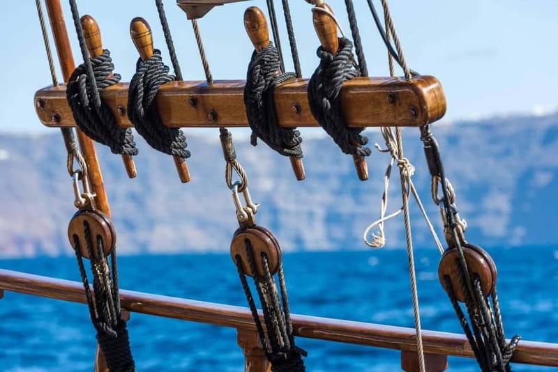 From Santorini: Volcano Cruise With Oia Sunset - Sailing through Santorini’s caldera