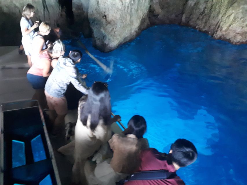 From St.Nikolaos: Boat Cruise to Navagio Beach & Blue Caves - The Blue Caves in electric blue water