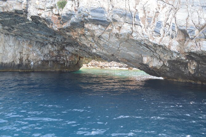 Full Day Catamaran Cruise in Paros - Simadoura’s rocky coast and small caves