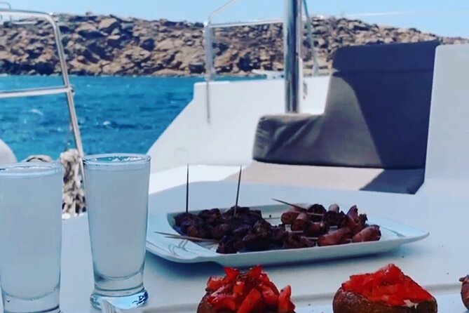 Full Day Discovering Mykonos Delos Renia Tour by Boat - Kalafatis and Mykonos’s southern beaches