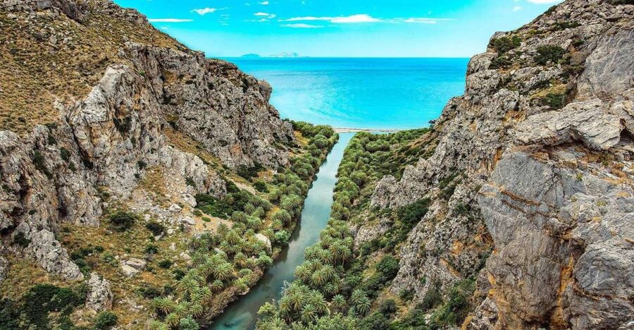 Georgioupolis: Preveli Palm Beach Day Trip by Bus and Boat - Reaching Preveli by water