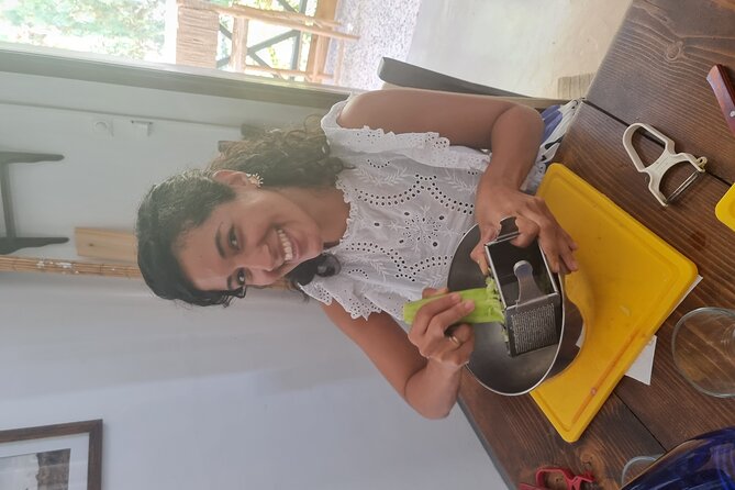 Greek Cuisine Cooking Class in Santorini with Recipes and Wine - Sitting down for lunch with Santorini wine