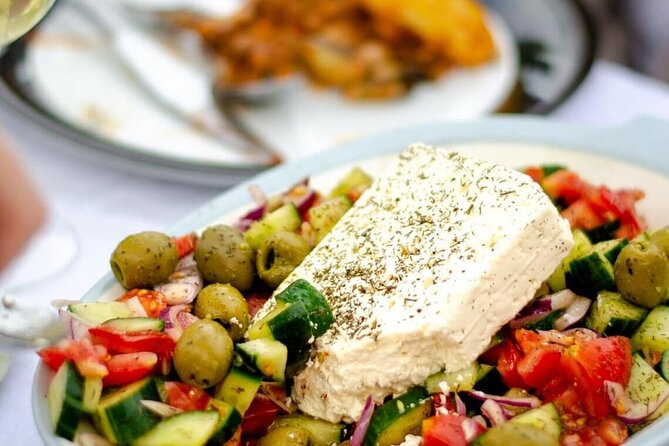 Greek Cuisine Cooking Class in Santorini with Recipes and Wine - Meeting Chef Christos and getting started