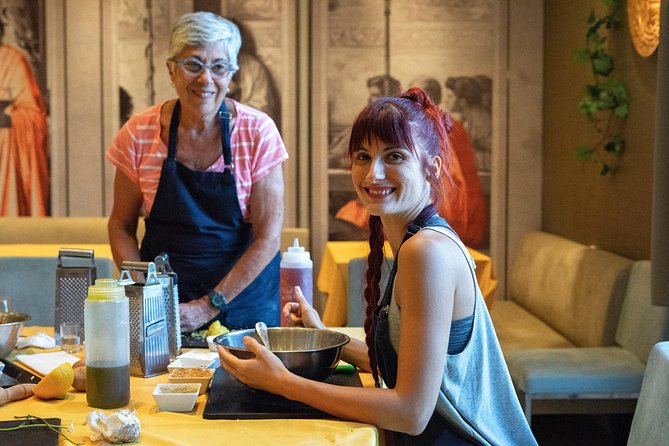 Greek Small-Group Athens Cooking Class & Dinner - Sitting down to eat what you made
