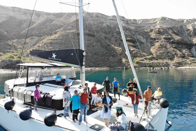 Half-Day Exclusive Catamaran Cruise in Santorini with Meal and Open Bar - Thirassia Island and lunch on board