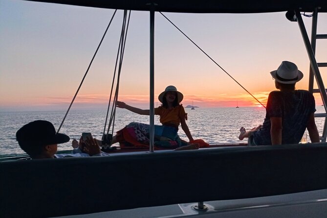 Half-Day Exclusive Catamaran Cruise in Santorini with Meal and Open Bar - Sailing past Fira and the Black Mountain