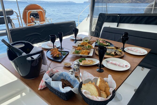 Half Day Premium Catamaran Cruise in Santorini including Oia - Oia and Ammoudi Bay: understand the wording