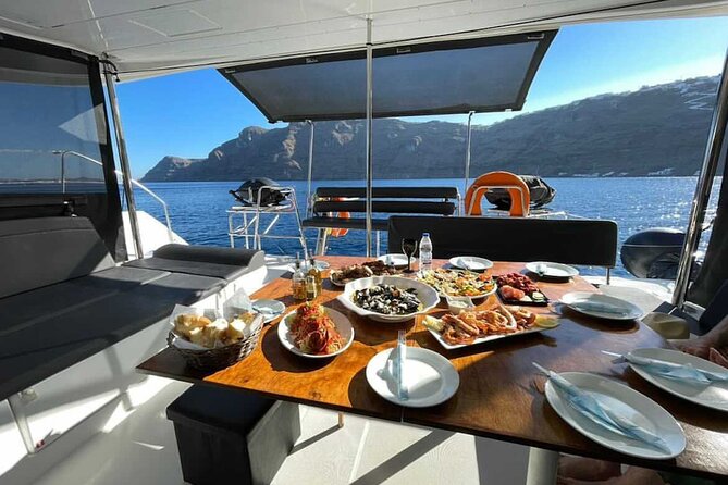 Half Day Premium Catamaran Cruise in Santorini including Oia - Red Beach: a quick first swim