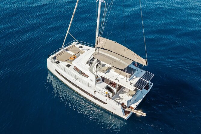 Hersonissos: Luxury Sunset Catamaran Cruise Sushi & Open Bar - Swimming, snorkeling, and paddleboarding