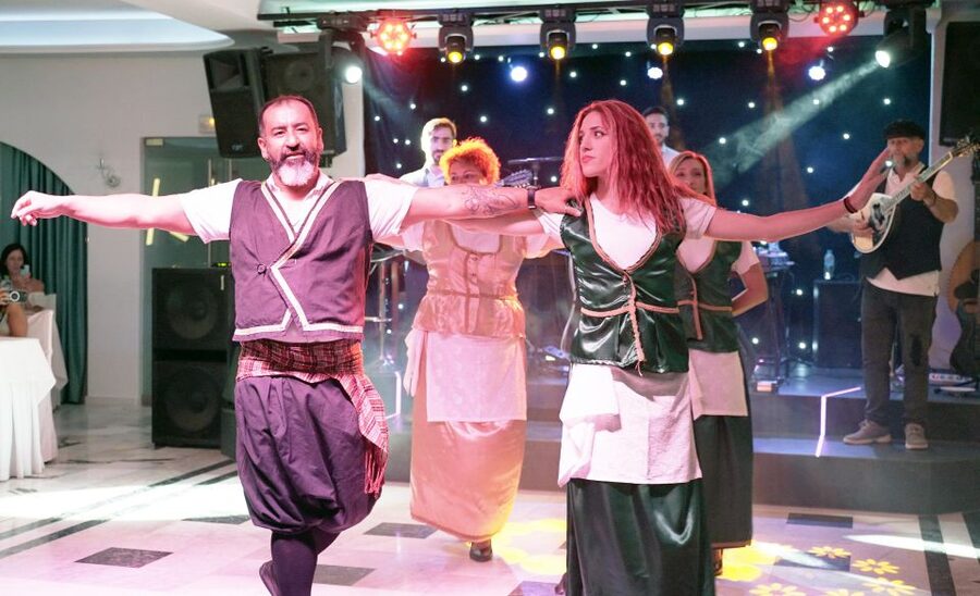 Kamari: Greek Show, Buffet Dinner, and Drinks at Dimitris - Costumed dancing and audience participation