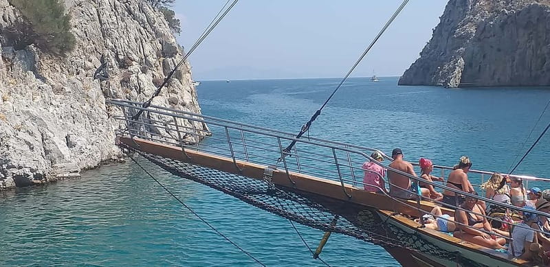 Kos: 3-Island Cruise with Greek BBQ Lunch and Swimming - Dolphin watching near Kos