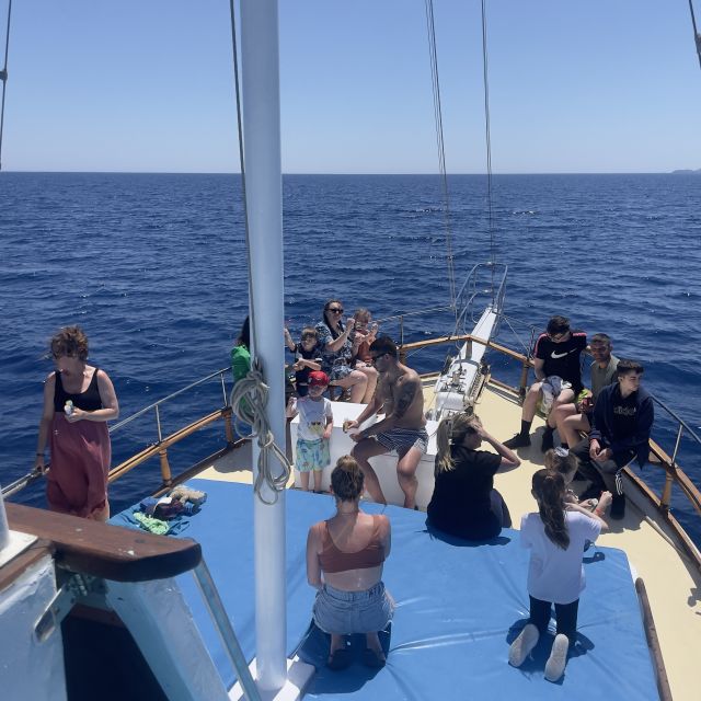 Lindos: Rhodes South-East Coast Cruise with Swim Stops - Guns of Navarone Bay: a bright first swim