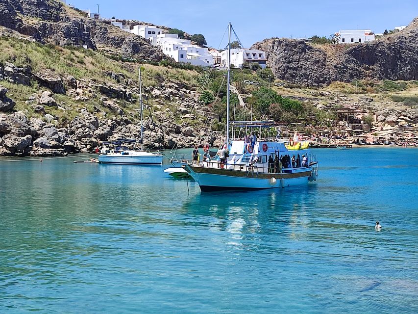 Lindos: Rhodes South-East Coast Cruise with Swim Stops - Cruising past Lindos and the ancient Acropolis