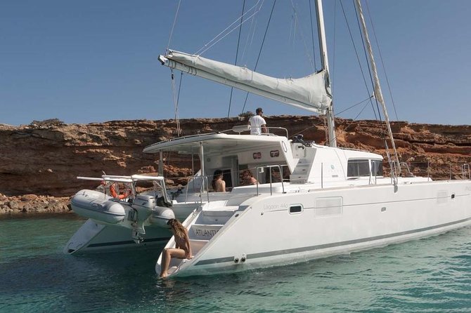 Luxury Catamaran Semi private cruise with meals & drinks and transportation. - Leaving Mykonos New Port by catamaran