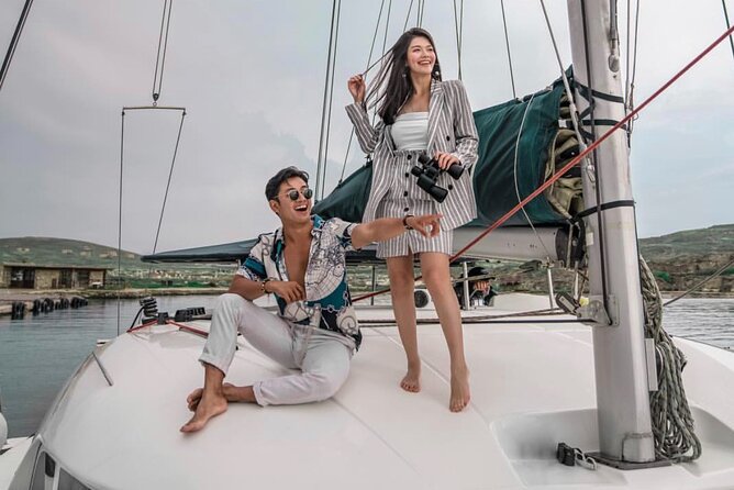 Luxury Catamaran Semi private cruise with meals & drinks and transportation. - Anchoring at Rhenia for clear water and lunch