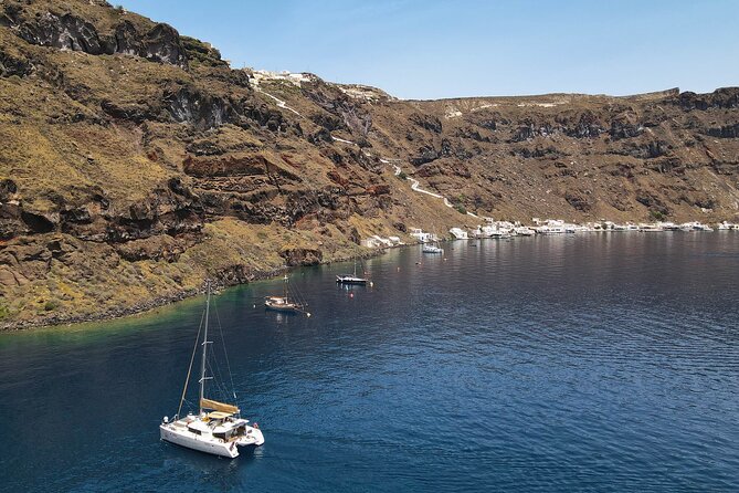 Luxury Santorini Sunset Cruise: Dinner, BBQ, Open Bar, Transfers - One Hour At Mesa Pigadia Beach