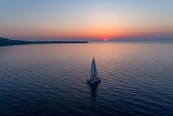 Luxury Sunset Cruise with Swim Stops, BBQ meals and Open Bar - Setting out across Santorini’s volcanic caldera