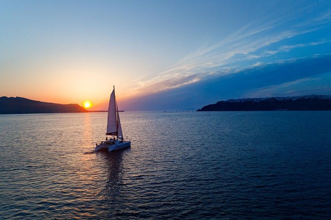 Luxury Sunset Cruise with Swim Stops, BBQ meals and Open Bar - The volcano and hot springs from the water