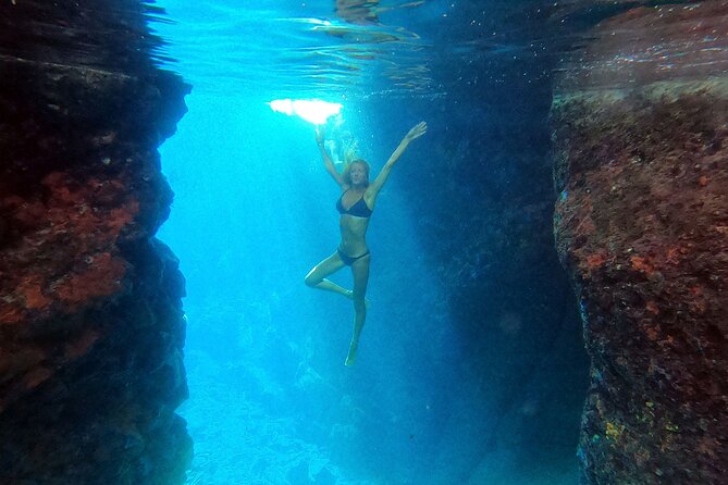 Milos caves snorkelling Catamaran Cruise in a small group - Sykia Cave: the first proper cave adventure