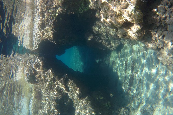 Milos Sailing Tour with snorkeling and lunch - The morning route past Milos’s unusual coast