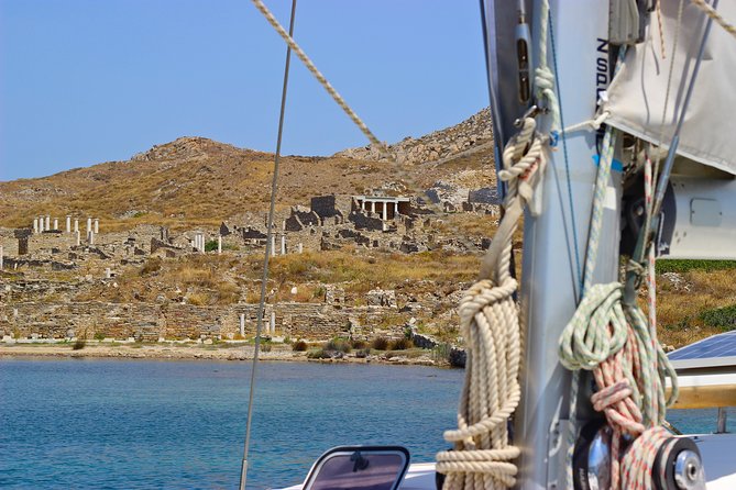 Mykonos Catamaran Private Sunset Cruise, Full Meal & Open-Bar - Swimming and snorkeling in quiet coves