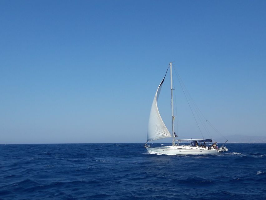 Mykonos: Delos and Rhenia Full-Day Sailing Cruise with Meal - Leaving Mykonos by yacht