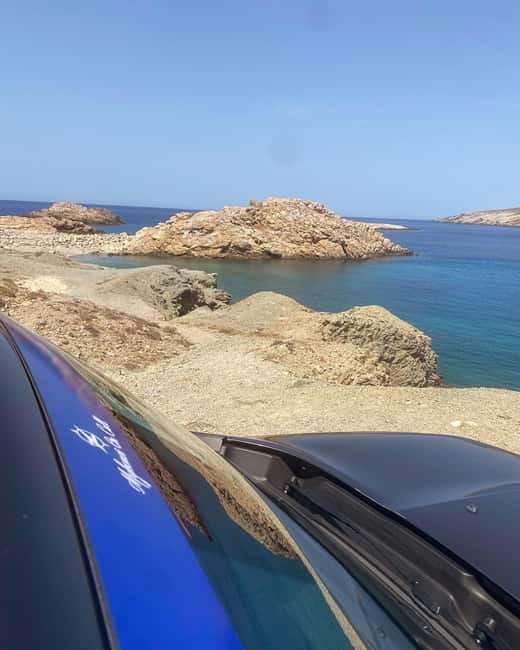 Mykonos: Private Island Tour with local guide -Jeep Renegade - Greek coffee, sweets, and a local pause