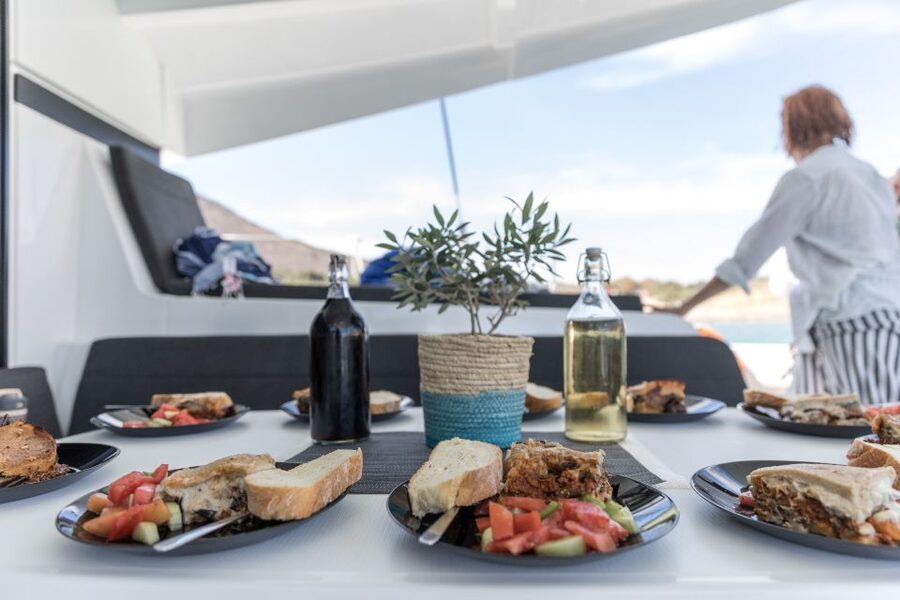 Naxos: Catamaran Cruise with Swim Stops, Food, and Drinks - Swim Stops in Sheltered Bays and Open Water