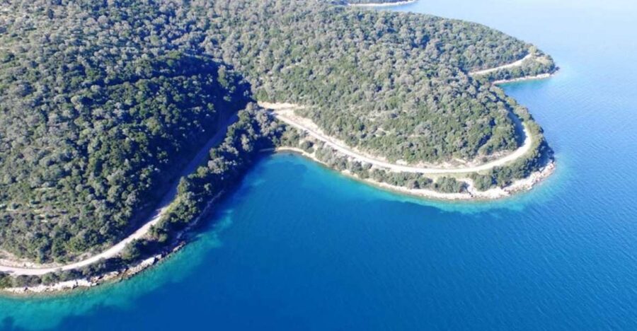 Nydri: Full-Day Sailing Cruise with Swim Stops & Meal - The first swim stop: a quiet beach near Skorpios