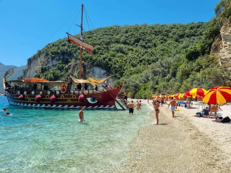 Nydri: Full-Day Wooden Boat Cruise with BBQ & Drinks - Klimaki Beach and the barbecue lunch