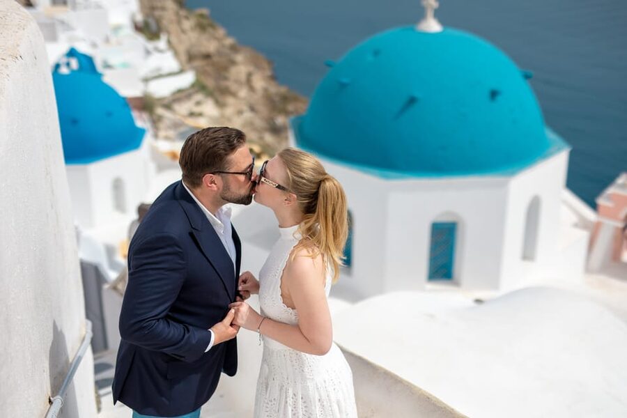 Oia: Couple photoshoot with 30 edited Photos - The First Stop: Oia’s Whitewashed Lanes
