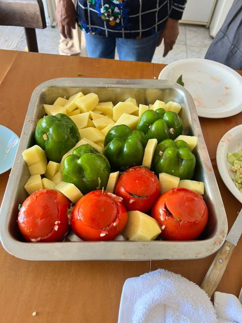 Oia: Greek Cooking Class and Lunch with a Local Grandmother - The four-course meal, from preparation to table