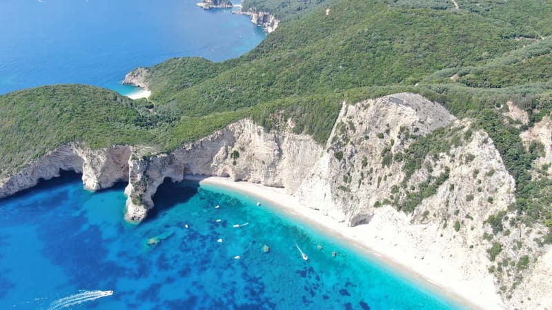 Paleokastritsa: Paradise, Yali Beach, & Blue Caves Boat Tour - Along Paleokastritsa’s dramatic western coast