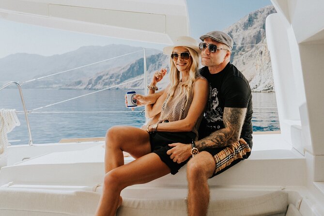 Panormo: Luxury Catamaran Cruise with Lunch & Open Bar - Gourmet bites and a clear-water swimming stop