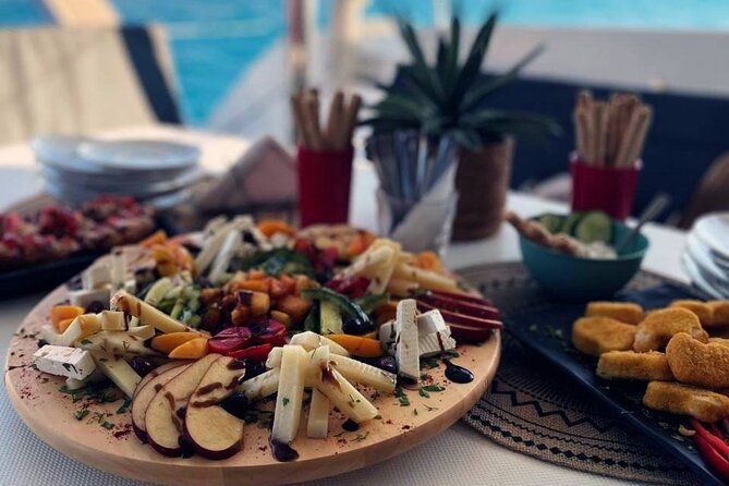 Panormo: Luxury Sunset Catamaran Cruise Sushi & Open Bar - Setting sail from Panormo Port