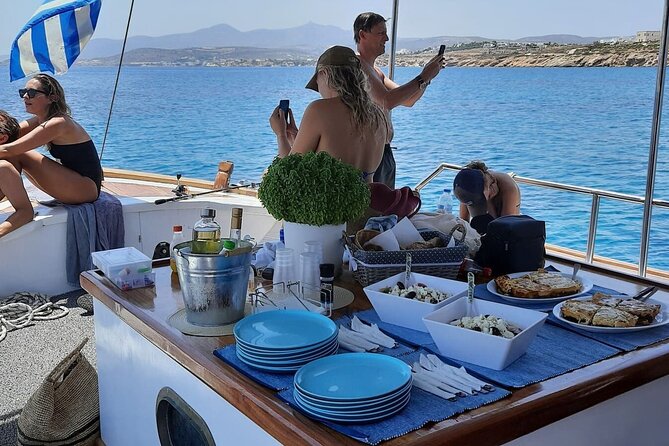 Paros Half Day Boat Tour from Naoussa port and Bay . - Swimming, snorkeling, and the boat itself