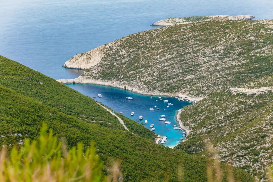 Porto Vromi: Navagio Shipwreck Beach & Blue Caves by Boat - Blue Caves from a small boat