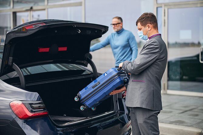 Private Arrival Transfer From Santorini Airport To All Destinations - Arriving at Thira Airport with a direct ride ahead