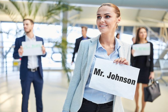 Private Arrival Transfer From Santorini Airport To All Destinations - Finding the driver in the crowded arrivals area