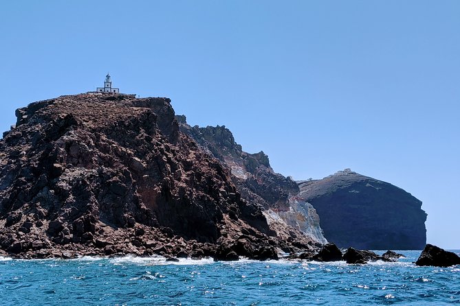 Private Full-Day Motor Yacht Cruise with Meal, Open Bar+Transfers - The Santorini Volcano and Palea Kameni hot springs