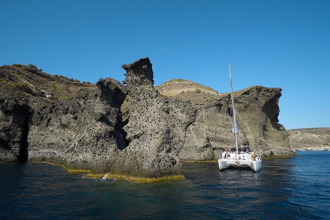 Private Luxury Santorini Catamaran Cruise with Port Pickup - Lunch, dinner, and drinks on the deck