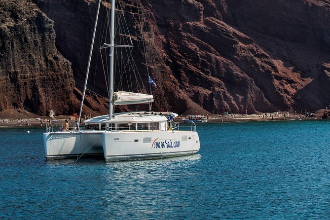 Private Morning Tour Lagoon 400-380 Sailing in Santorini ,lunch, drink, transfer - Weather, swimming, and practical limits